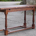 Console table in quarter-sawn oak with turned legs